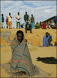 photo of prisoners in sun after being let out of their cells